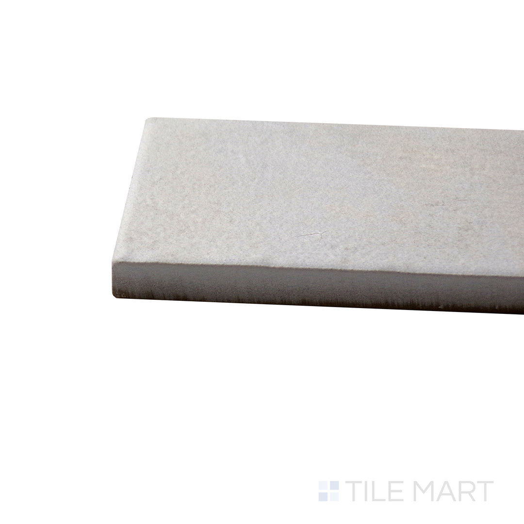 Side perspective of Gandia White 2X6 Matte Porcelain Tile, capturing its crisp white color with a soft, natural matte texture.