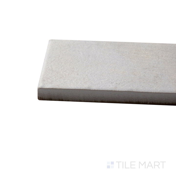 Side perspective of Gandia White 2X6 Matte Porcelain Tile, capturing its crisp white color with a soft, natural matte texture.