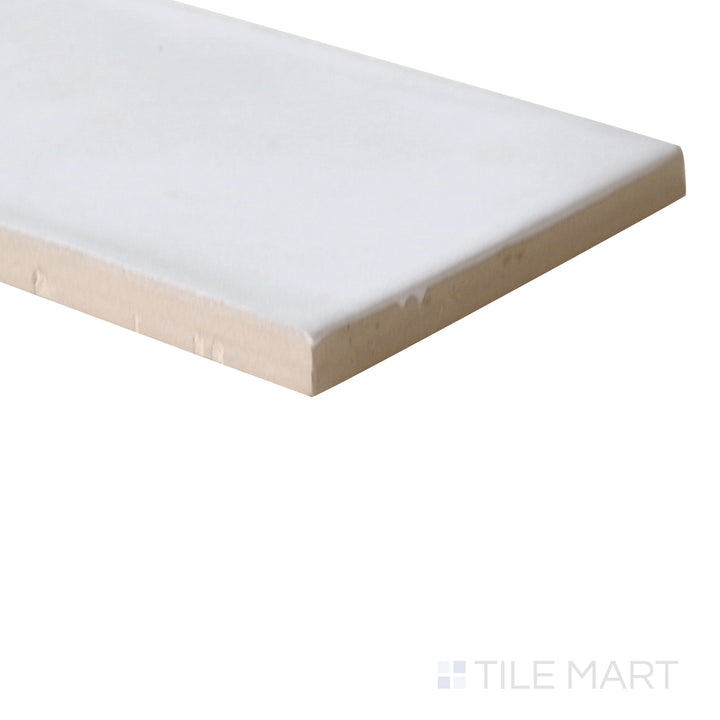 Angled shot of Ghent Alpine White 3x9 matte porcelain tile, featuring a classic white finish, smooth matte texture, and a structured rectangular shape.  