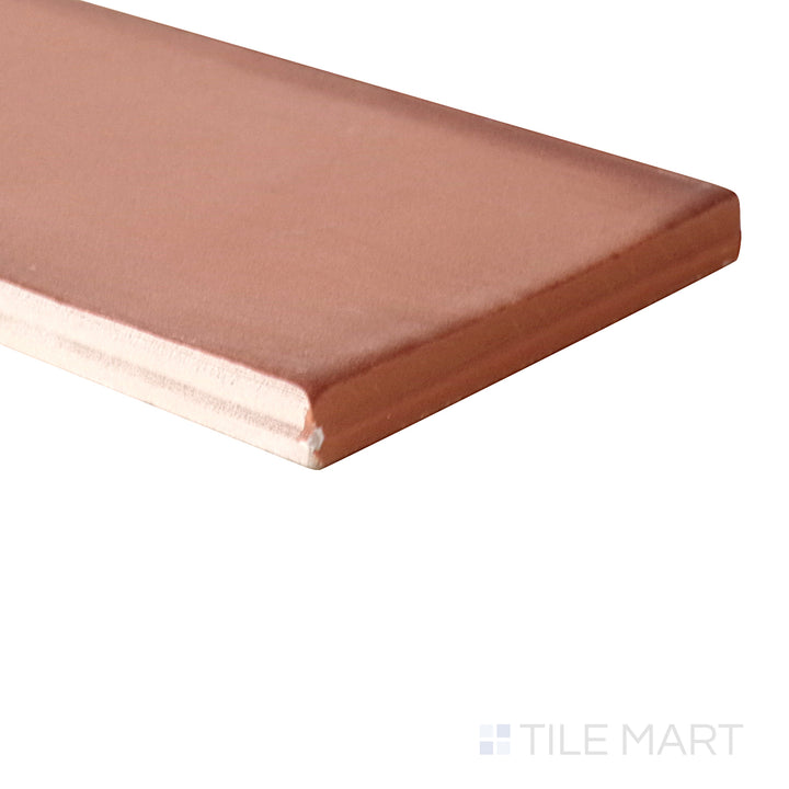 Diagonal view of Ghent Copper 3x9 matte porcelain tile, showcasing its rich copper hues, elegant matte surface, and elongated rectangular format.  