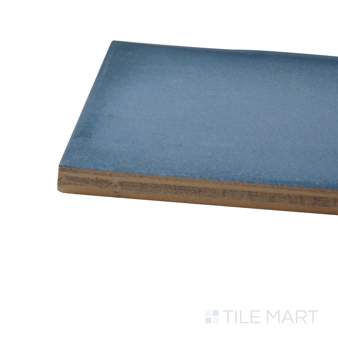 Corner angle of Ghent Steel Blue 3X9 Matte Porcelain Tile, emphasizing its striking steel blue color with a soft, smooth matte texture.