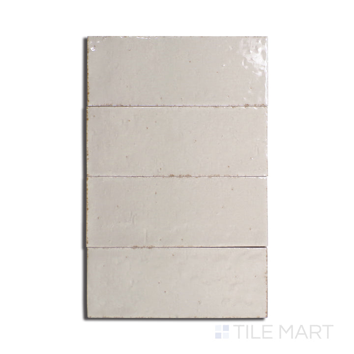 Bird’s-eye perspective of Glace Mastice 3X8 Glossy Porcelain, a soft gray-toned tile with a reflective glossy finish, perfect for a sleek aesthetic.