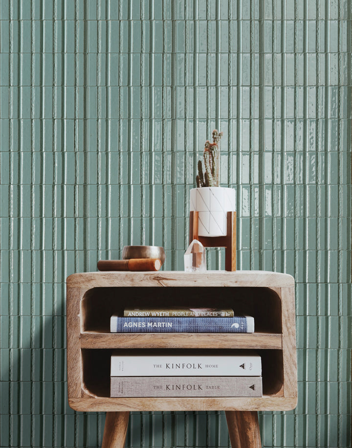 Interior view featuring Glace Turchese 3X8 Glossy Porcelain, where vibrant turquoise hues bring a lively and modern touch to the design.