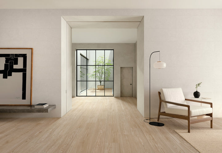 A sophisticated and organic look with Grainier Maple 10X60 Matte Porcelain, adding warmth and character.