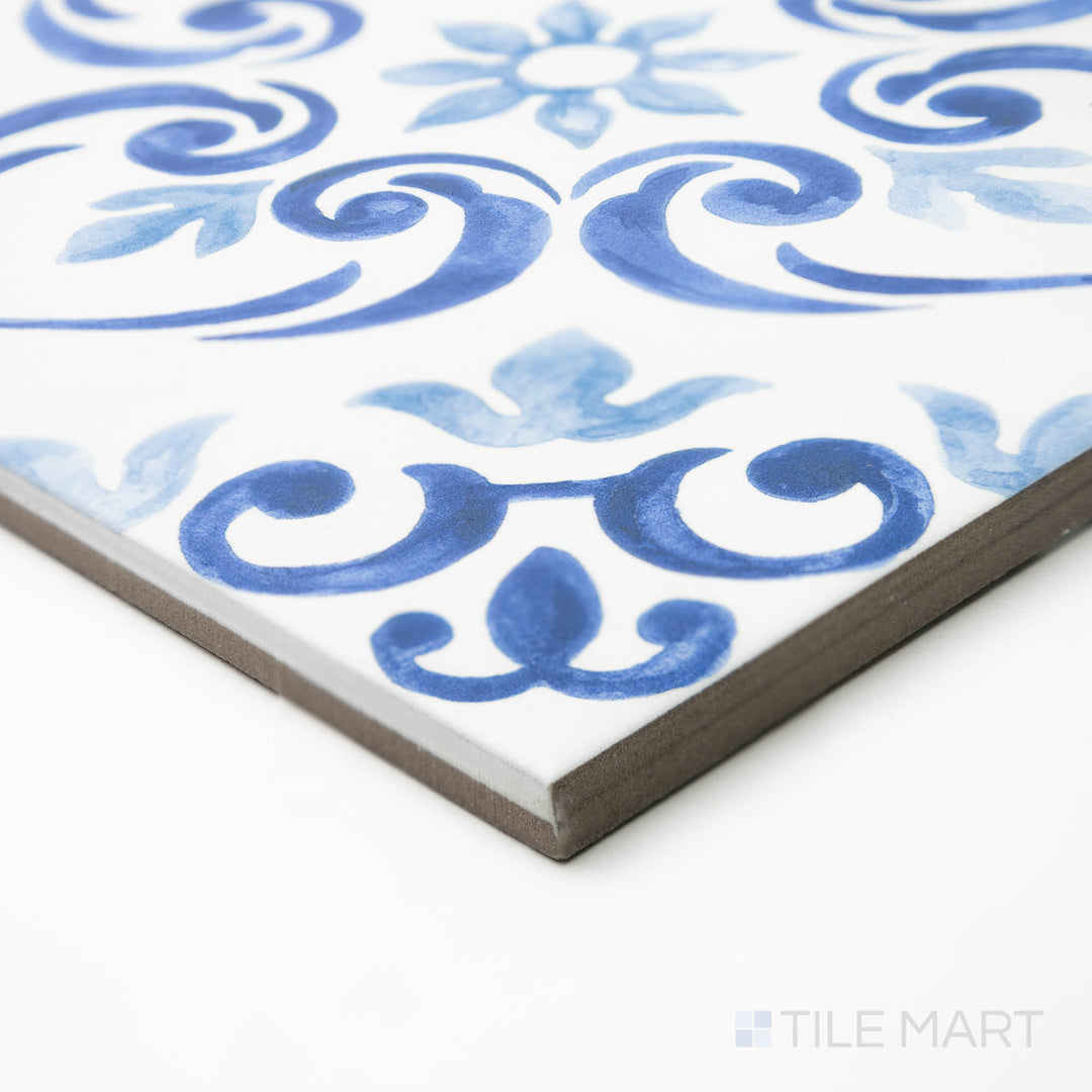 Corner shot of Mestral Bloom 9x9 matte porcelain tile, drawing attention to its subtle floral-inspired design and the clean-cut edges that define its structured form.