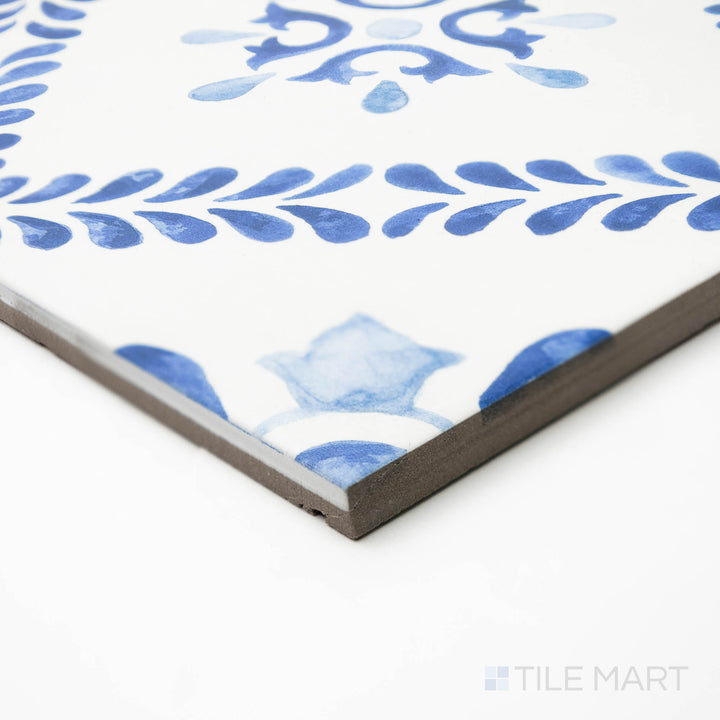 Close-up corner perspective of Mestral Diamond 9x9 matte porcelain tile, showcasing its symmetrical design, soft matte texture, and refined edge detail.