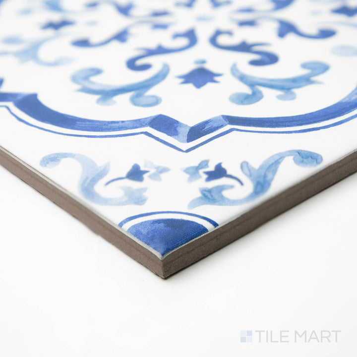 Corner-focused image of Mestral Rosette 9x9 matte porcelain tile, bringing attention to its delicate patterns and the way the edges transition into a crisp angle.