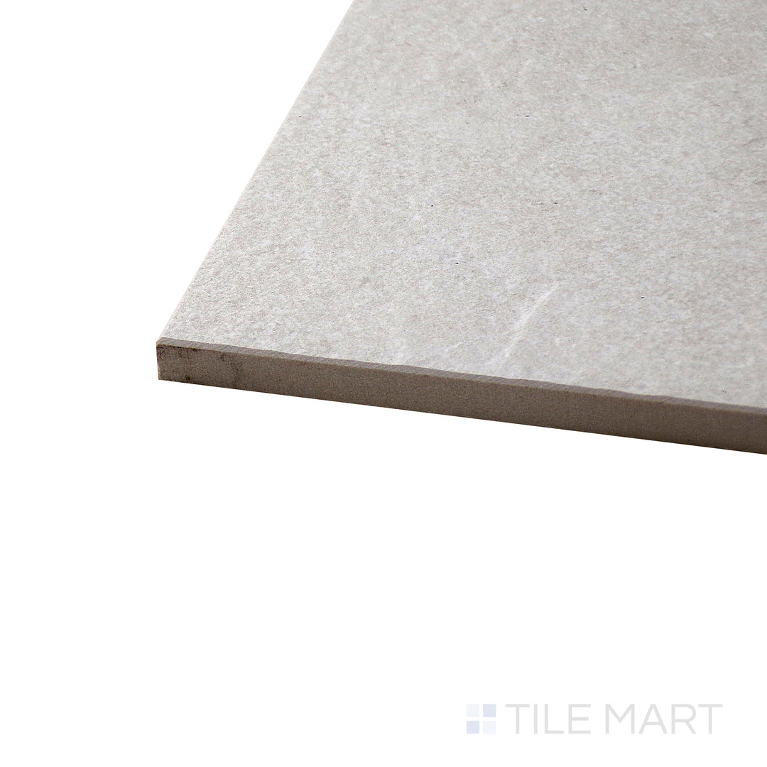 Angled perspective of Motley Rio 12x24 matte porcelain tile, capturing its contemporary design, soft matte finish, and seamless edge alignment at the corner.