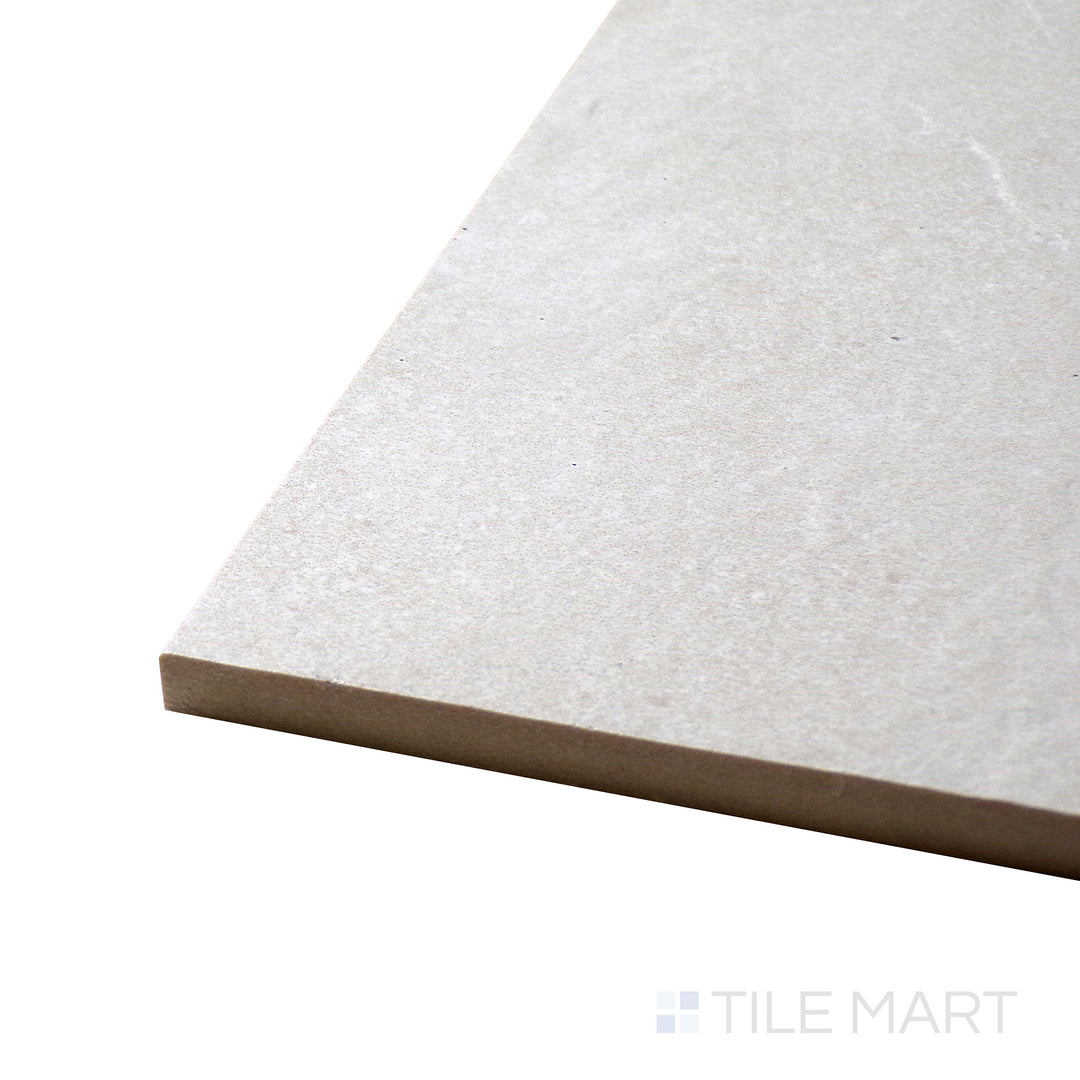 Corner shot of Motley Rio 24x48 matte porcelain tile, displaying its expansive surface, gentle color gradient, and structured edge definition.