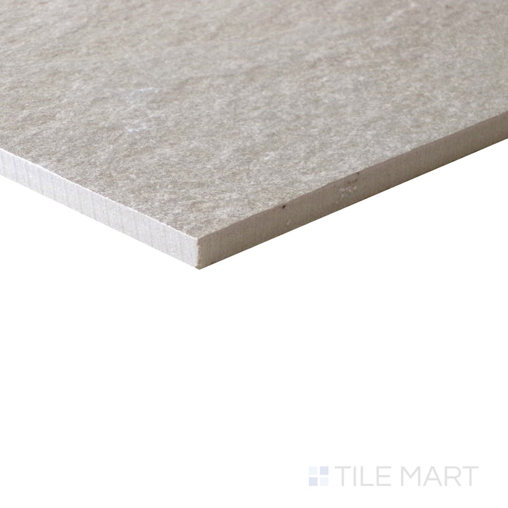 From a close-up angle, the Motley Wembley 24x48 matte porcelain tile emphasizes its smooth surface and natural tonal variations, creating a minimalist yet elegant effect.