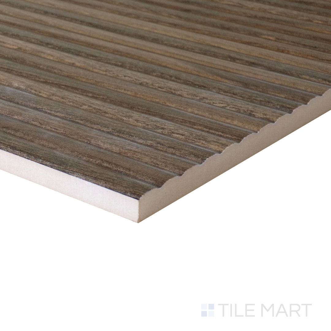 Slanted perspective of Ribbon Wood Coffee 12.4x39.4 matte ceramic tile, emphasizing its deep coffee brown shade, subtle wood textures, and refined matte surface.  