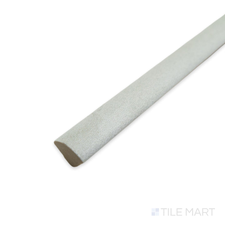 Corner view of Tetris White 0.5x8 matte porcelain jolly tile, showcasing a crisp white finish with straight edges and a subtle matte texture.