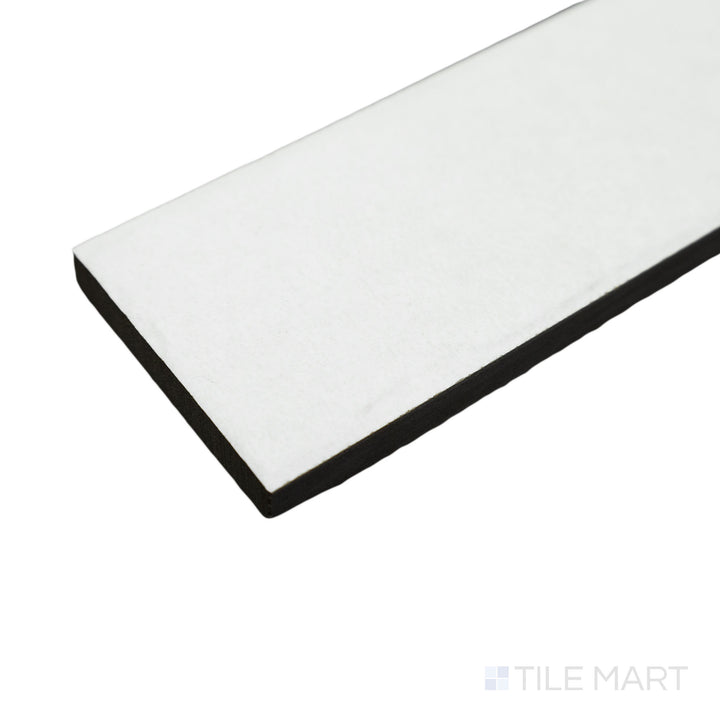 Corner-focused image of Tetris White 2x8 matte porcelain tile, presenting a clean, bright surface with precise edge detailing and a soft matte finish.