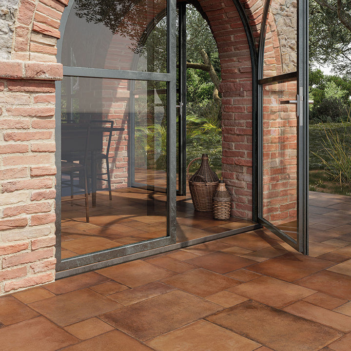 Warm, earthy tones with a classic Versailles pattern bring a timeless European charm, making Valdorcia Cotto Versailles Pattern matte porcelain a perfect fit for rustic and traditional interiors.