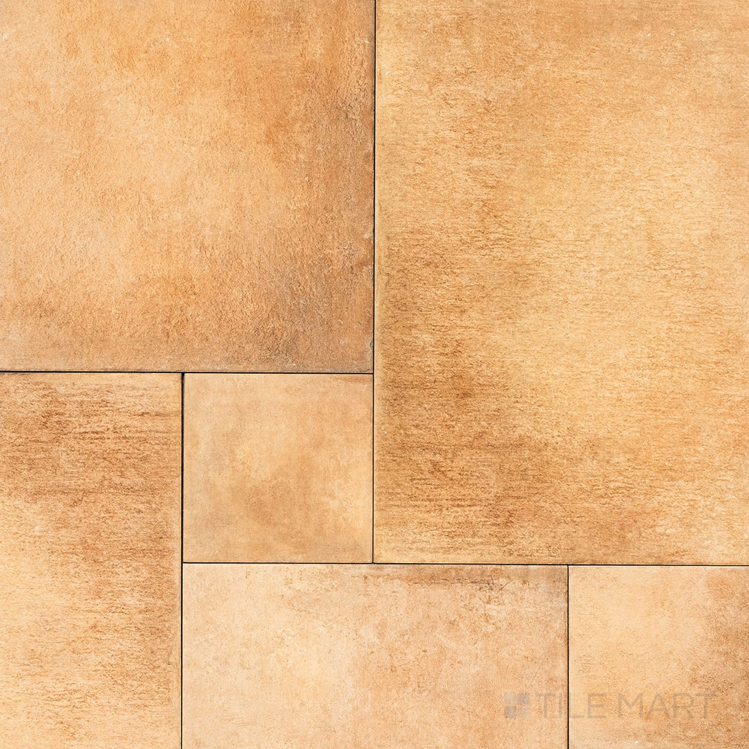 Flat-lay image of Valdorcia Ocra Versailles Pattern Matte Porcelain, a golden-toned tile with a structured Versailles pattern, perfect for old-world charm.