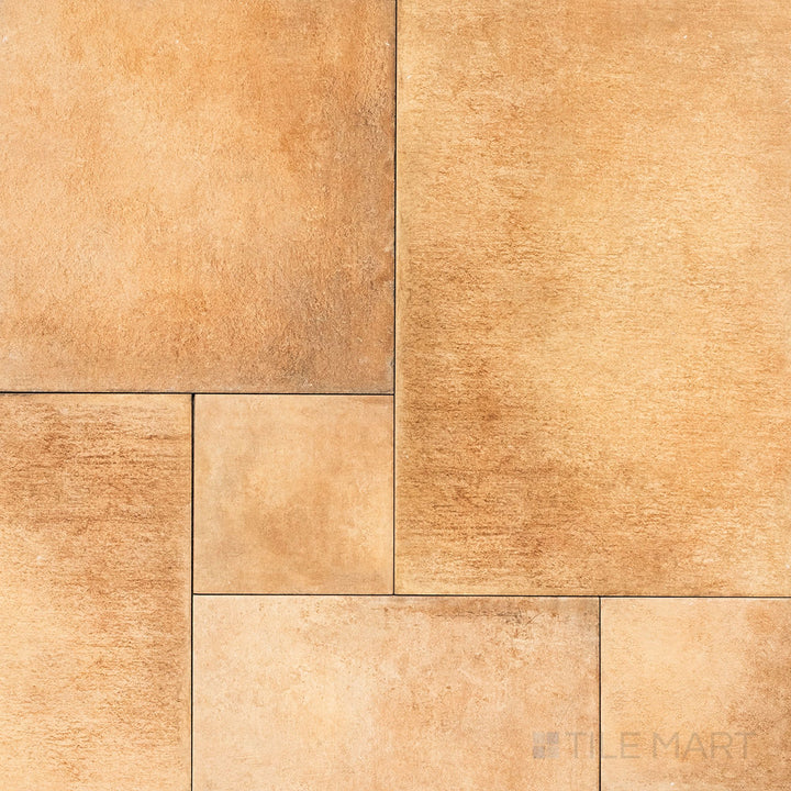 Flat-lay image of Valdorcia Ocra Versailles Pattern Matte Porcelain, a golden-toned tile with a structured Versailles pattern, perfect for old-world charm.