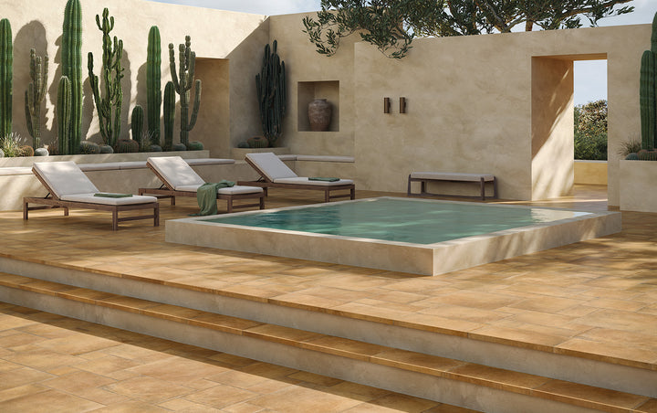 Rich ochre hues with an intricate Versailles pattern create a warm and inviting aesthetic, complementing the space with Valdorcia Ocra Versailles Pattern matte porcelain.