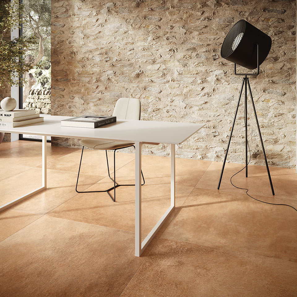 A golden-toned foundation enhances the space with a timeless elegance, working in harmony with Valdorcia Ocra Versailles Pattern Matte Porcelain.