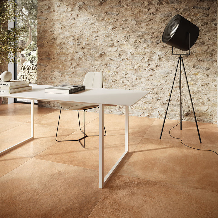 A golden-toned foundation enhances the space with a timeless elegance, working in harmony with Valdorcia Ocra Versailles Pattern Matte Porcelain.