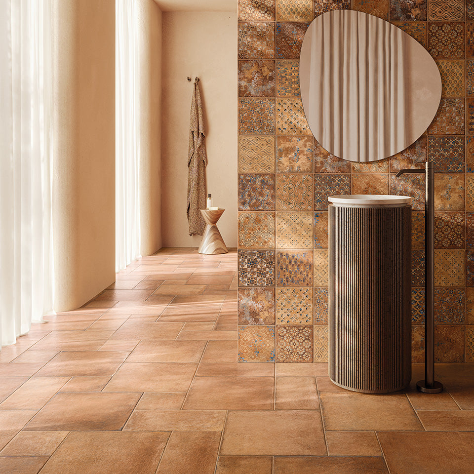 A sophisticated interior showcasing Valdorcia Terracotta Versailles Pattern Matte Porcelain, adding depth and character with its rich, sun-kissed hues and dynamic pattern.