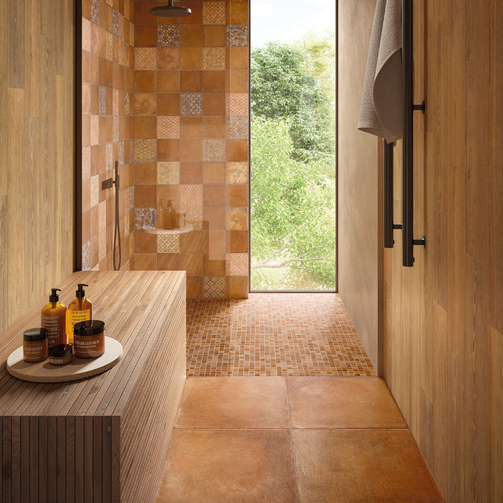 A bold terracotta hue with a classic Versailles pattern, Valdorcia Terracotta matte porcelain evokes traditional beauty.