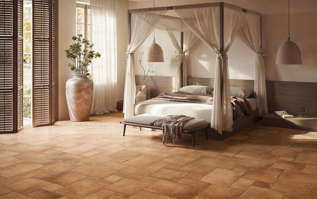 Deep terracotta shades with a classic, weathered appearance add old-world character, enhancing interiors with Valdorcia Terracotta Versailles Pattern matte porcelain.