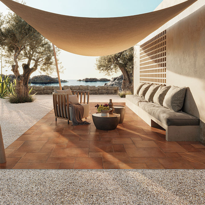 Rich terracotta shades bring warmth and Mediterranean charm, beautifully pairing with Valdorcia Terracotta Versailles Pattern Matte Porcelain.