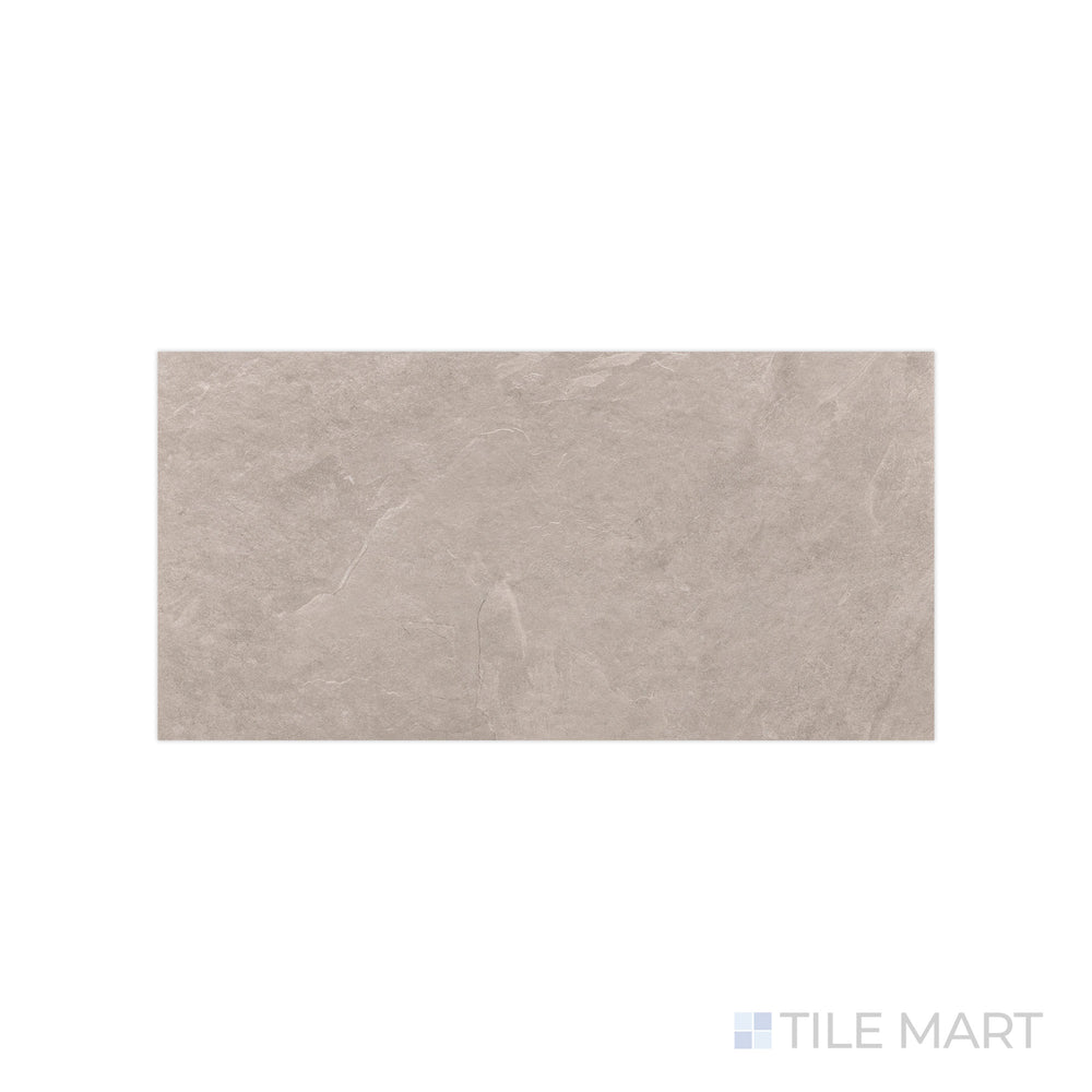 A soft beige hue with a smooth matte texture is displayed in this close-up of Ash Beige 12x24 matte porcelain tile, bringing a neutral yet sophisticated appeal.