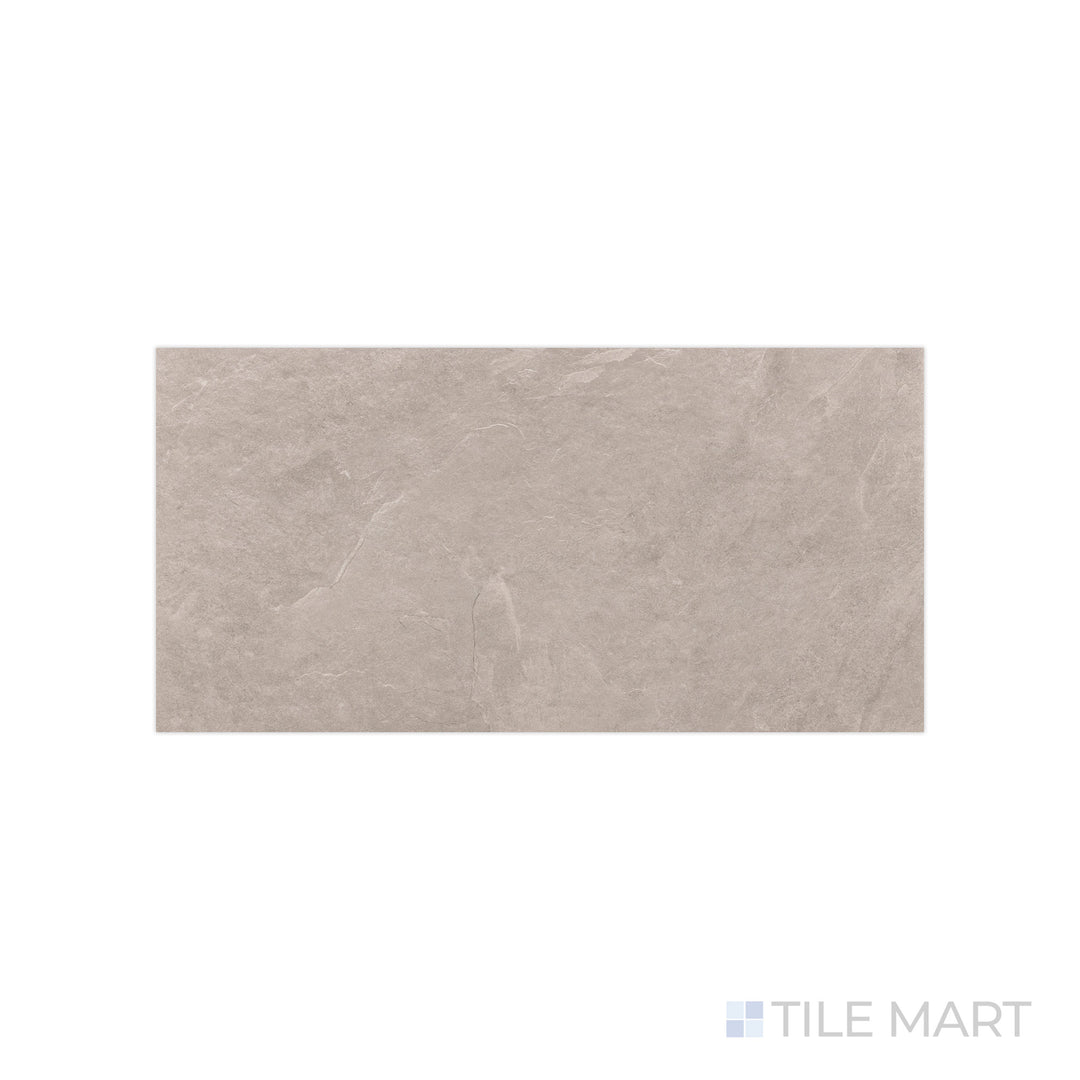 A soft beige hue with a smooth matte texture is displayed in this close-up of Ash Beige 12x24 matte porcelain tile, bringing a neutral yet sophisticated appeal.