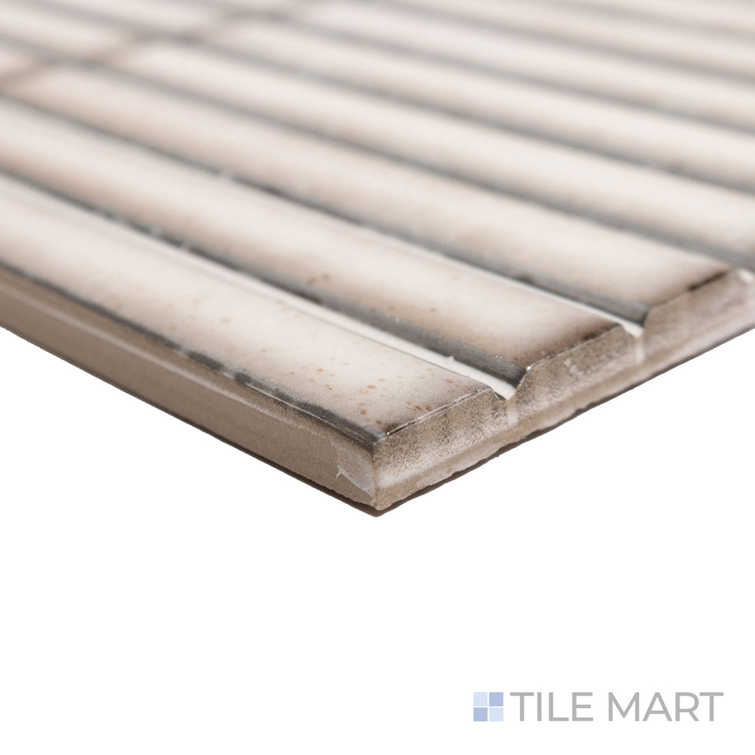 Close-up corner perspective of Karatsu Chalky 4.5x9 matte porcelain tile, focusing on its light neutral color, refined edges, and a smooth, consistent surface.