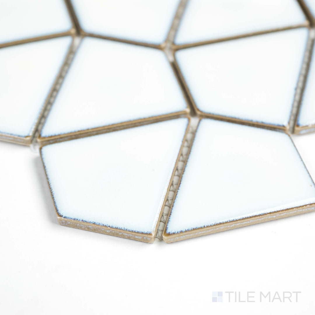 Corner angle highlights the aged white Dragonscale mosaic’s textured matte finish and unique porcelain pattern.