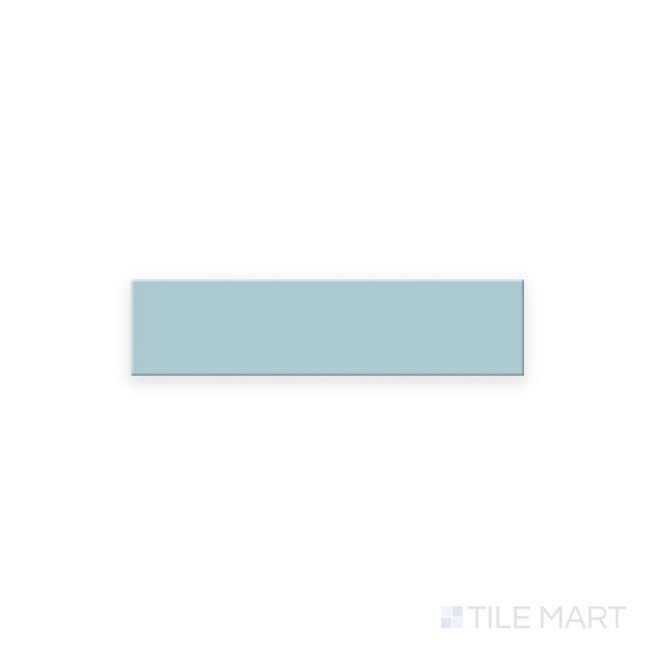 Top-down image of Glenbrook Quiet Moments 2x8 flat matte ceramic tile, displaying a tranquil muted blue-grey hue with a soft, flat ceramic finish.