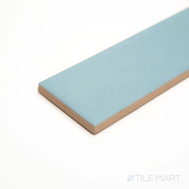 Glenbrook Quiet Moments tile, viewed at an angle, offers a calm gray hue with a flat matte ceramic texture.