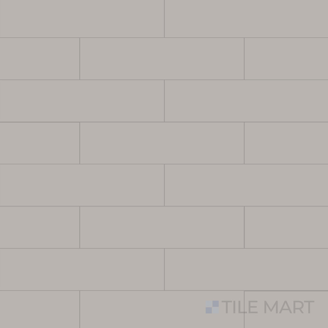 Flat-lay image of Glenbrook Rustic Greige 2X8 Matte Ceramic, featuring a warm greige tone with a rustic texture for a natural appearance.