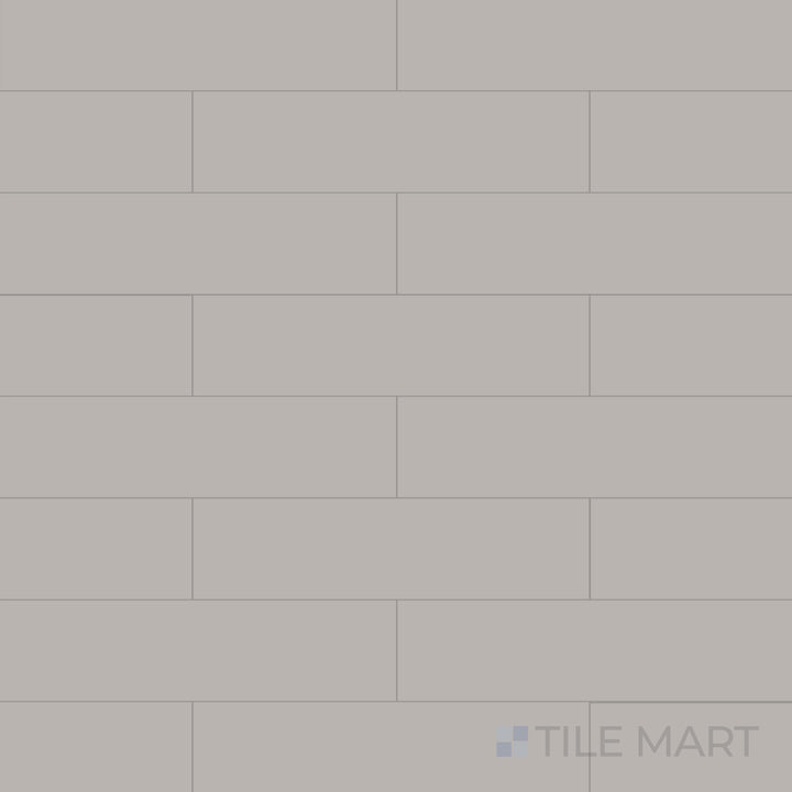 Flat-lay image of Glenbrook Rustic Greige 2X8 Matte Ceramic, featuring a warm greige tone with a rustic texture for a natural appearance.