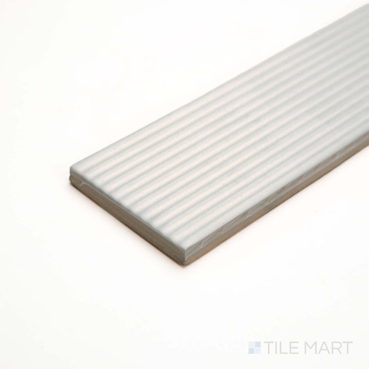 The Glenbrook Polar White striped tile adds soft texture, captured beautifully in this corner view.