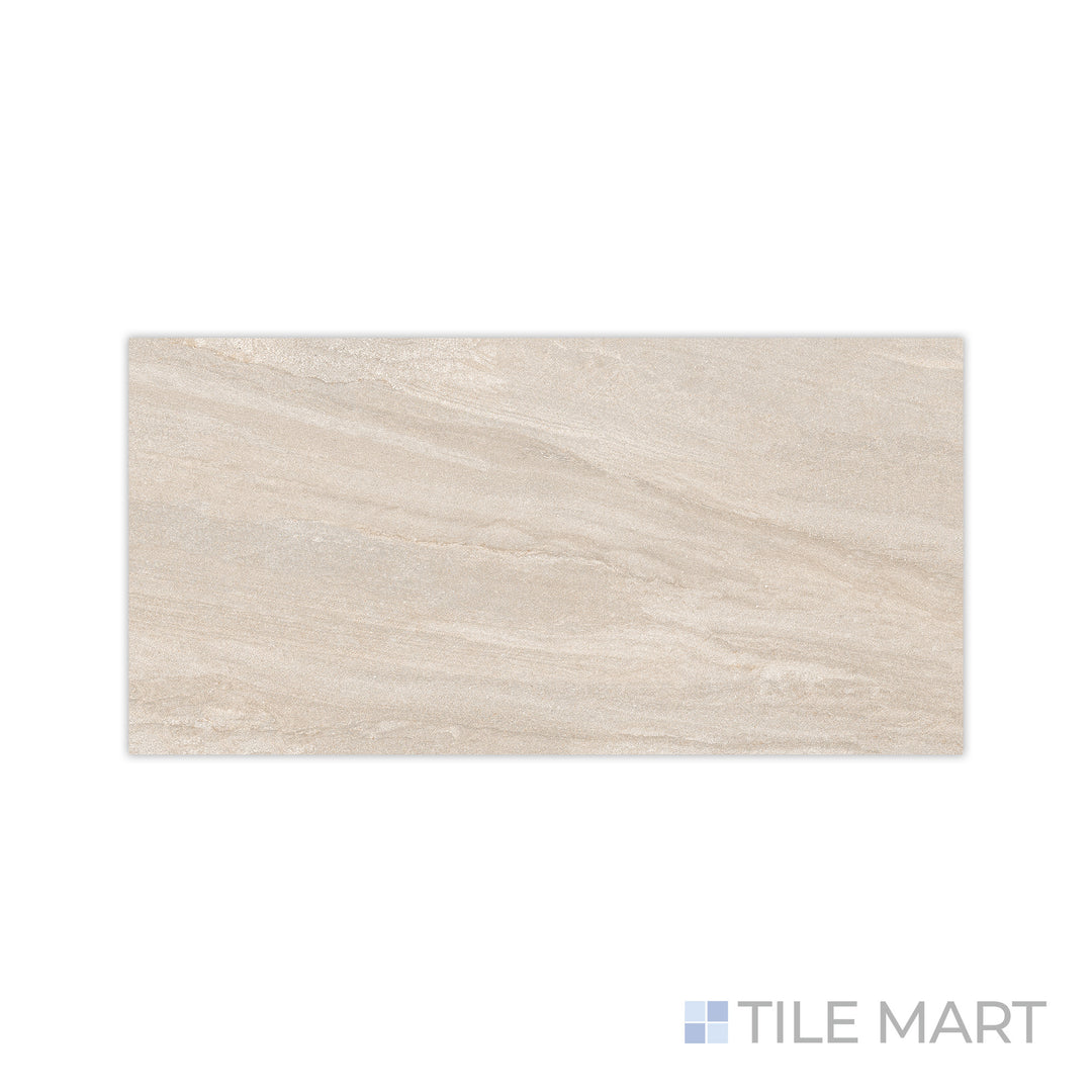 A warm, sandy texture is revealed in this detailed close-up of Origin Desert 24x48 matte porcelain tile, showcasing its natural desert-toned hues and soft matte finish.