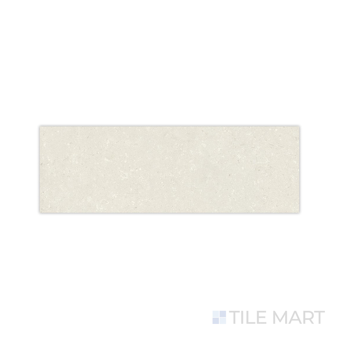 A natural coral-inspired matte surface is magnified in this detailed close-up of Pietra Coral Natural 12x36 matte porcelain tile, showcasing its raw and organic beauty.