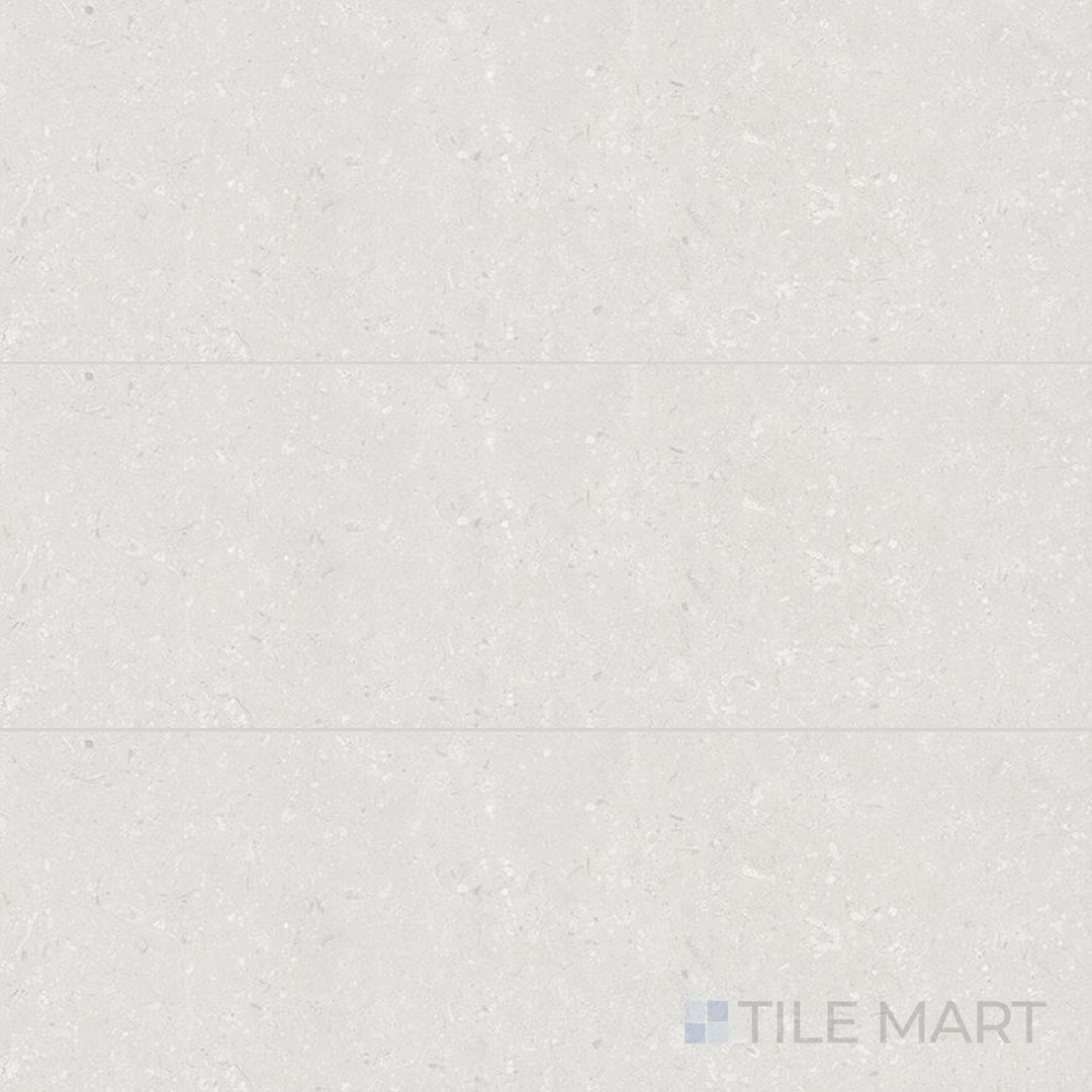 Top-down view of Pietra Coral Pearl 12X36 Matte Porcelain, a soft-toned tile with subtle veining and a matte finish.