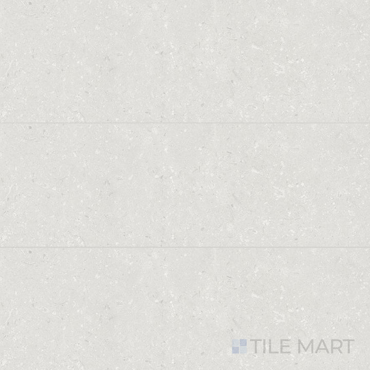 Top-down view of Pietra Coral Pearl 12X36 Matte Porcelain, a soft-toned tile with subtle veining and a matte finish.