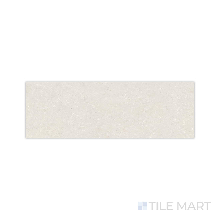 A warm sandy tone with a soft matte finish is displayed in this close-up of Pietra Coral Sand 12x36 matte porcelain tile, emphasizing its organic and refined feel.