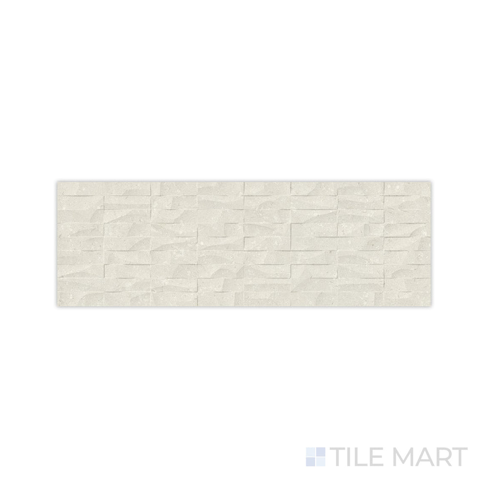 A natural, stone-like texture is captured in this macro shot of Pietra Coral Natural 12x36 matte porcelain tile, featuring muted earthy tones with a refined matte surface.