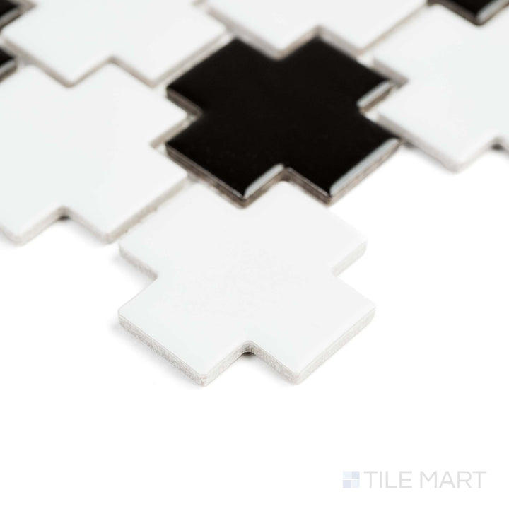From a side perspective, the White and Black Cross matte mosaic highlights striking dual-tone porcelain patterns.