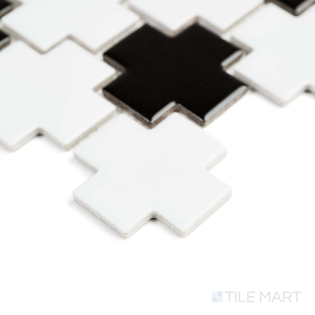 From a side perspective, the White and Black Cross matte mosaic highlights striking dual-tone porcelain patterns.