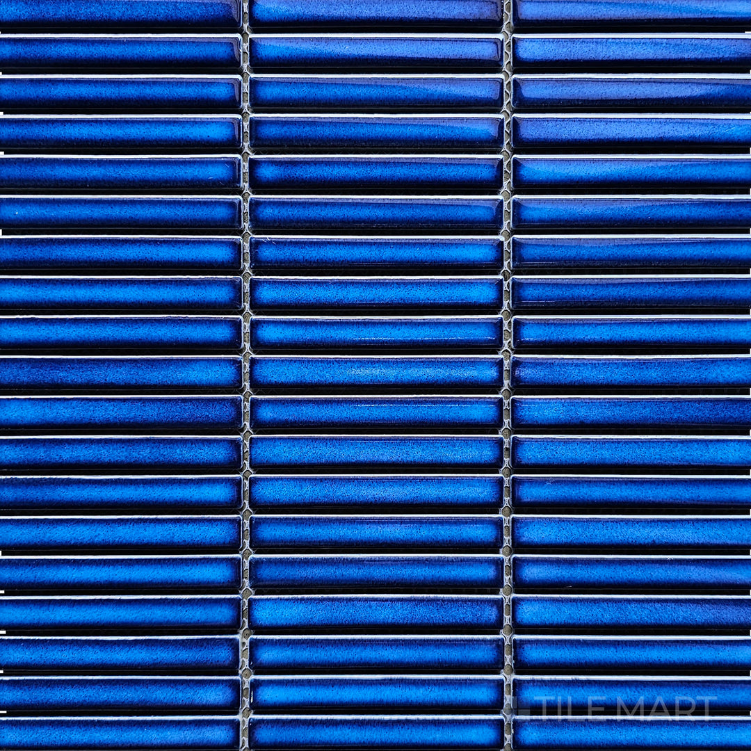Overhead view of Porcelain Glazed Mosaics Cobalt Blue Mini Sticks Matte, a sleek linear mosaic tile in a vibrant cobalt blue shade with a matte finish.
