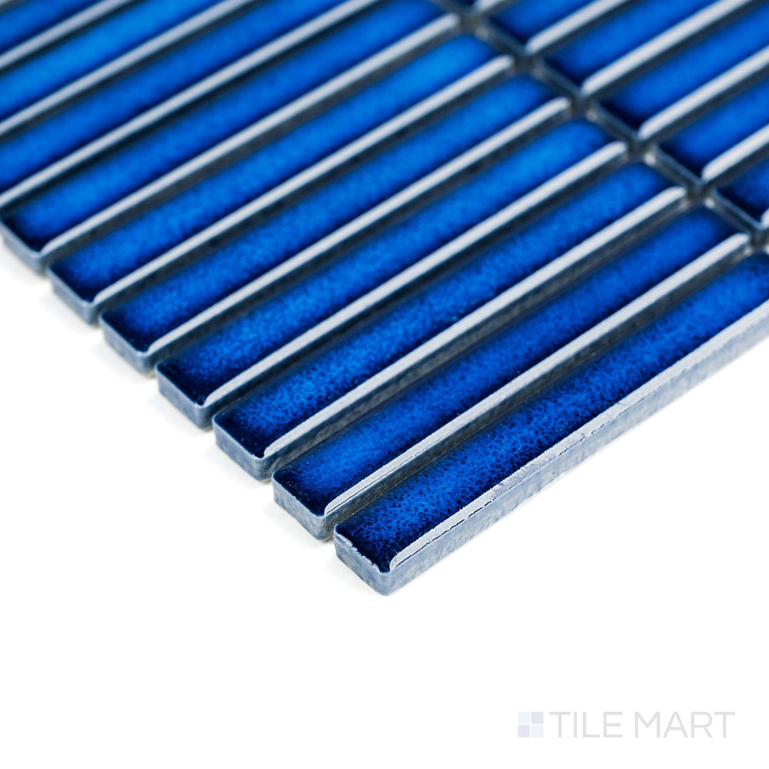 Corner detail shows Cobalt Blue Mini Sticks matte mosaic with its slim vertical lines and vibrant hue.
