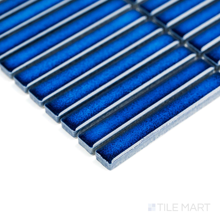 Corner detail shows Cobalt Blue Mini Sticks matte mosaic with its slim vertical lines and vibrant hue.