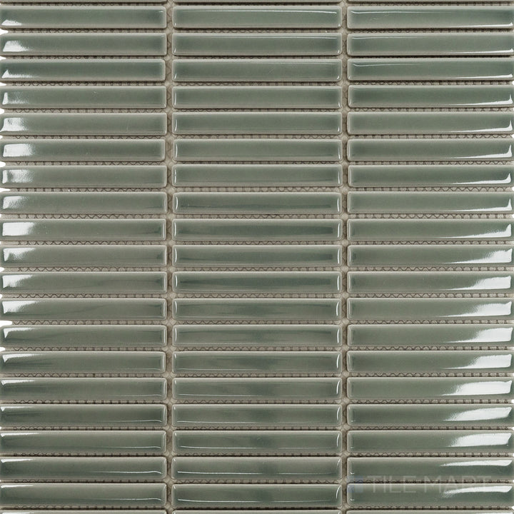 Overhead image of Porcelain Glazed Mosaics Aged Grey Mini Sticks Glossy, a unique mosaic tile with a blend of light and dark greys in a glossy finish.