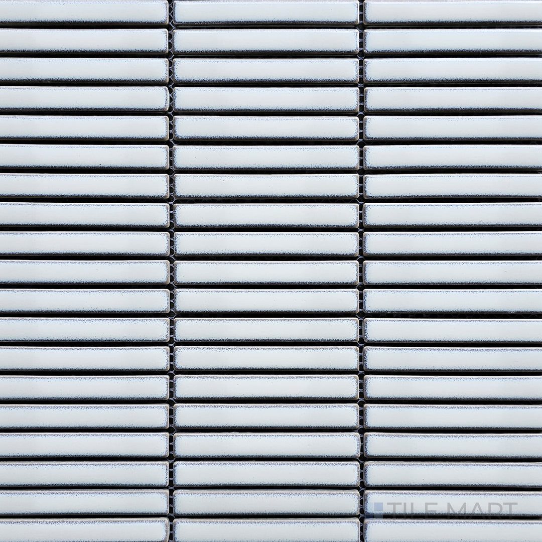 Bird’s-eye view of Porcelain Glazed Mosaics Aged White Mini Sticks Matte, a textured white mosaic tile with a soft matte finish for a refined look.