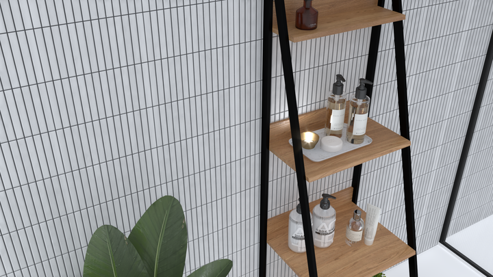 A crisp white matte surface with a refined texture enhances the space with a clean and contemporary feel, beautifully styled with Roku White 4.5x9 matte porcelain.